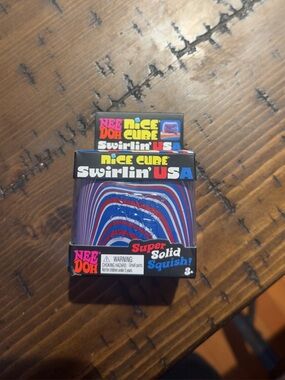 SUPER RARE LIMITED EDITION NeeDoh Swirlin USA Super Solid Squish Cube